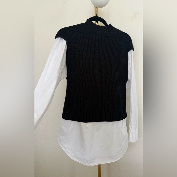 Calvin Klein black sweater vest layered over white long-sleeve button-down shirt - Picture 5 of 7